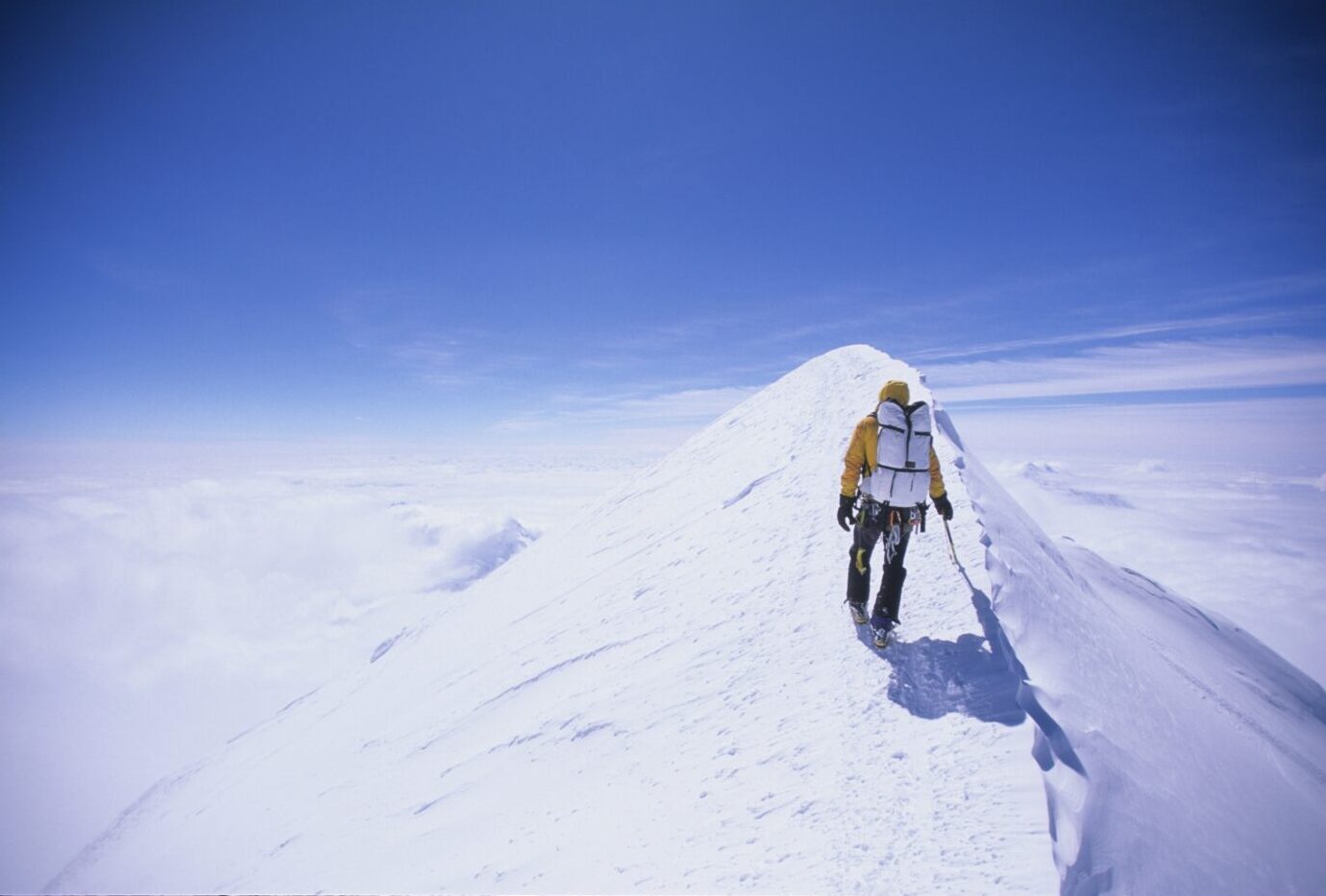 Hiker on the summit of a mountain
